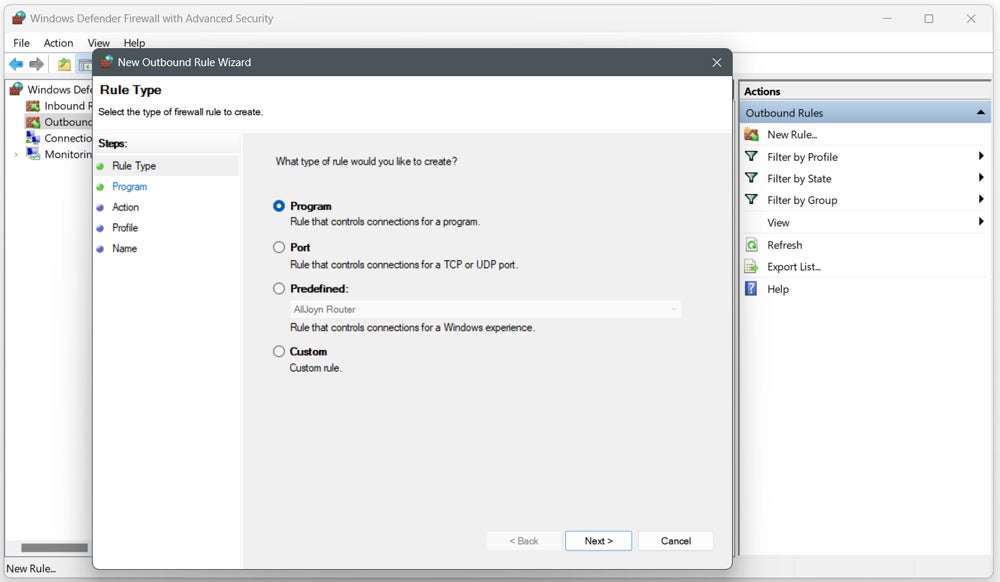 Selecting a rule type on the New Outbound Rule Wizard window.